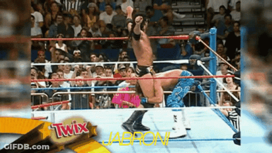 Shawn Michaels Throwing Razor Ramon Outside The RIng GIF