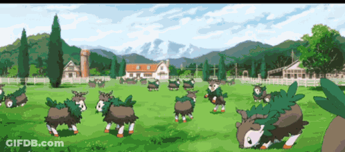 Sheep Standing In Field With Mountains GIF