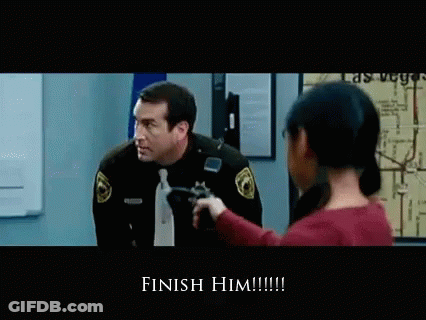 Sheriff Pointing Gun At Girl Saying Finish Him GIF