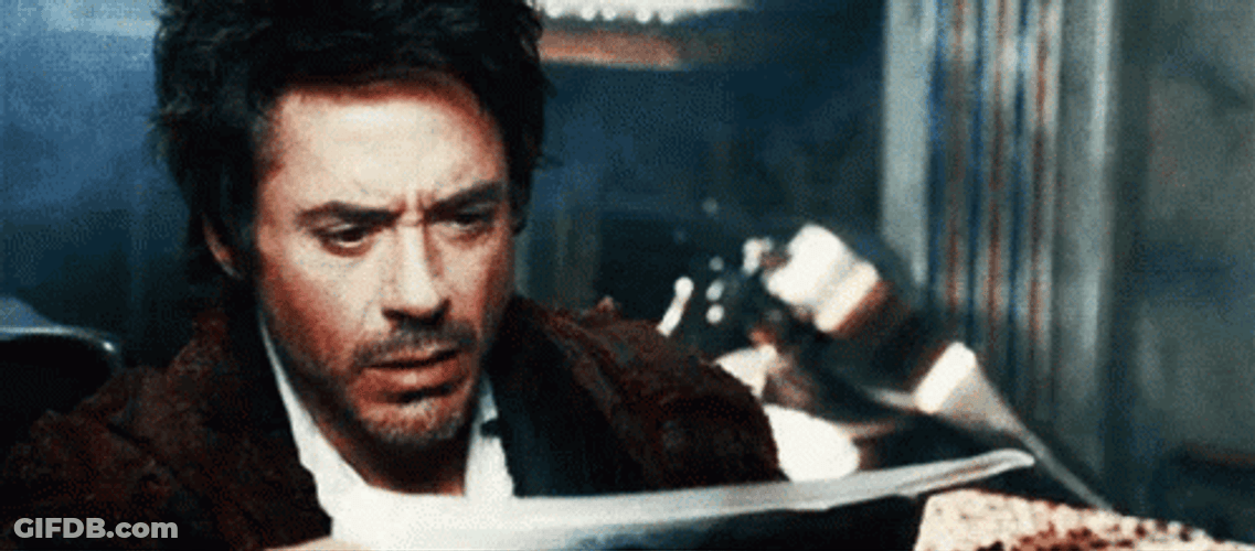 Sherlock Holmes Reading A Newspaper GIF