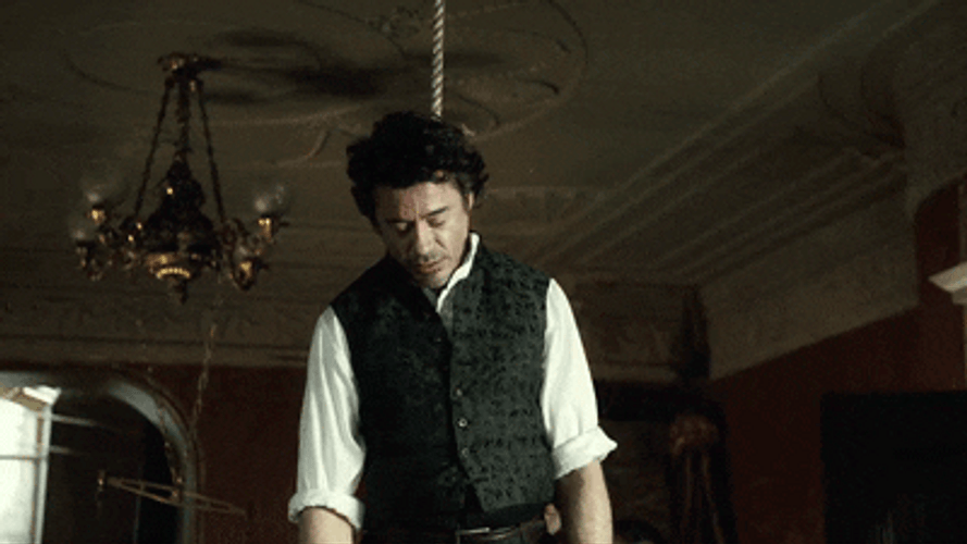 Sherlock Robert Downey Hanging On Ceiling GIF