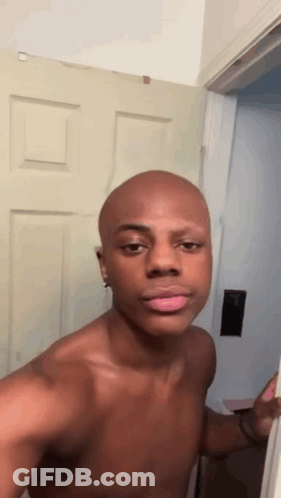 Shirtless Bald Man Standing GIF