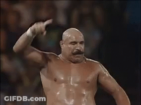 Shirtless Bald Man With Mustache In Wrestling Ring GIF