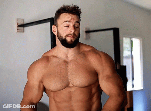 Shirtless Bearded Man Eyes Closed In Mirror GIF