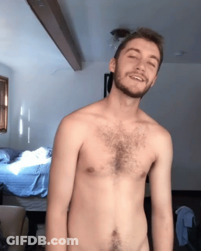 Shirtless Bearded Man Smiling In Room GIF