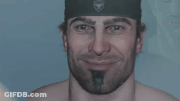 Shirtless Bearded Man With Headband Making Face GIF