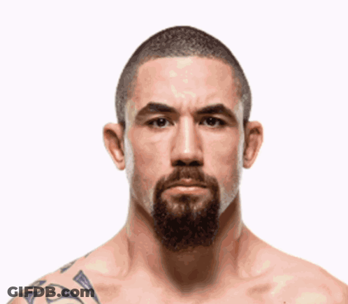 Shirtless Bearded Man With Shoulder Tattoo GIF