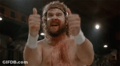 Shirtless Bearded Wrestler Giving Thumbs Up GIF
