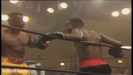 Shirtless Boxer With Red Gloves Oof Sign GIF