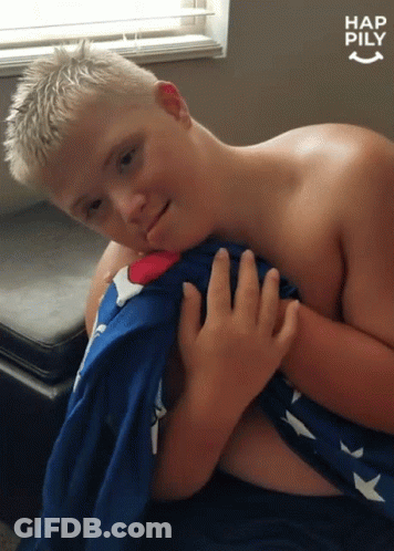 Shirtless Boy Holding Blue And White Blanket Hap Pily GIF
