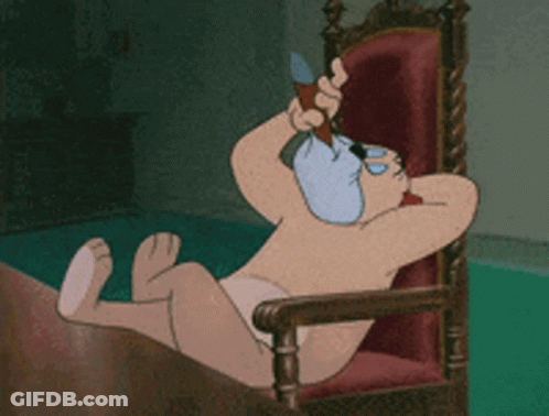 Shirtless Cartoon Sitting In Chair Holding Pen GIF