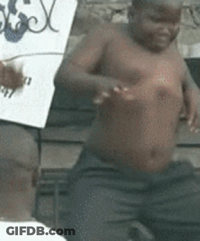 Shirtless Child Sitting Next To Man Holding Sign GIF