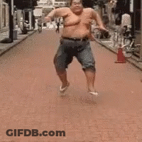 Shirtless Fat Man Running Down Street GIF