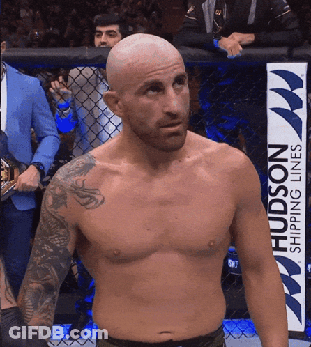 Shirtless Fighter In Front Of Hudson Shipping Line Sign GIF