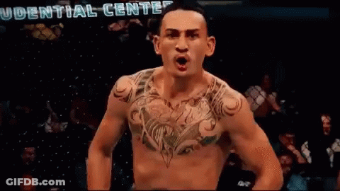 Shirtless Fighter With Chest Tattoo GIF