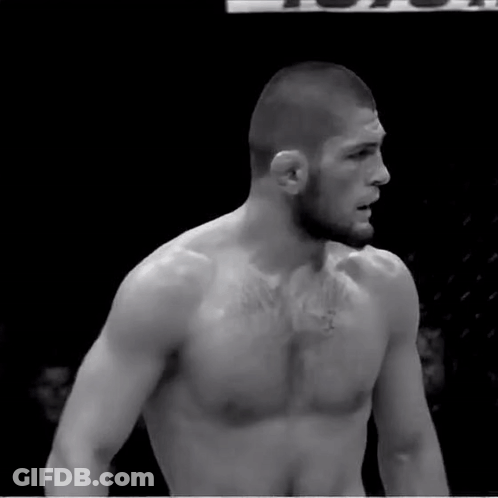 Shirtless Fighter With Toyota Sign Behind Him GIF