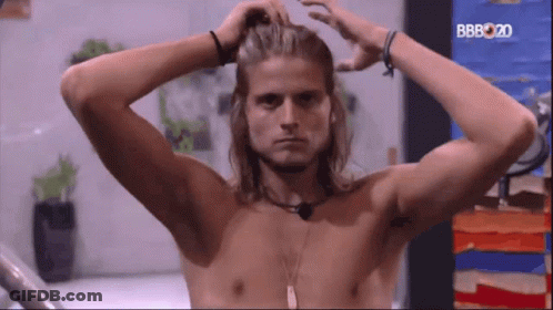 Shirtless Long-Haired Man In Front Of BB2020 Screen GIF