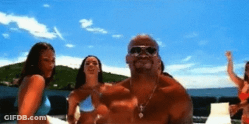 Shirtless Man And Two Bikini Women On Beach GIF