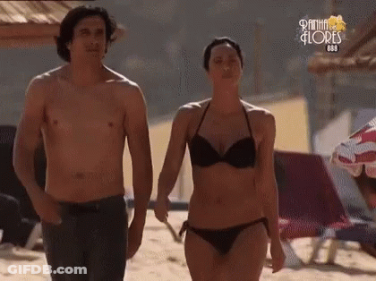 Shirtless Man And Woman In Bikini On Beach Praia Flores GIF