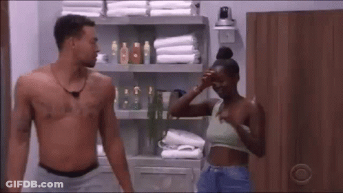 Shirtless Man And Woman Standing In Bathroom GIF