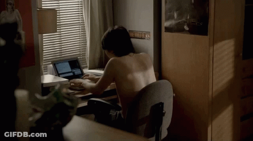 Shirtless Man At Desk With Laptop GIF