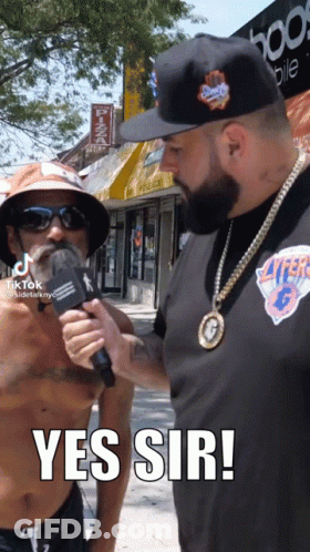 Shirtless Man Being Interviewed GIF