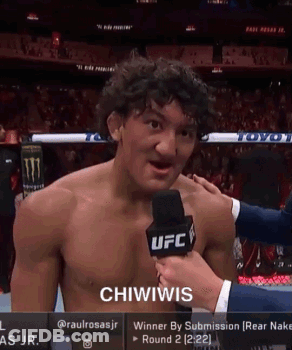 Shirtless Man Being Interviewed GIF