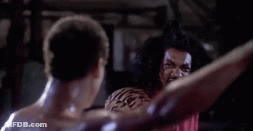 Shirtless Man Boxing In Dark Room GIF