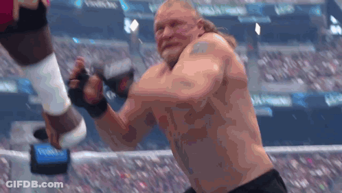 Shirtless Man Boxing In Stadium GIF