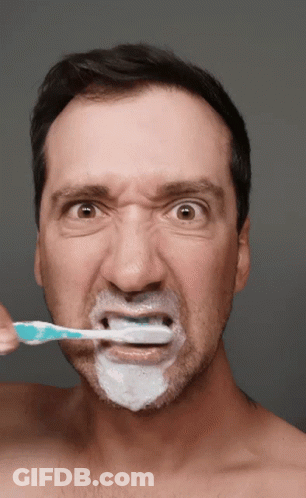 Shirtless Man Brushing Teeth GIF