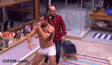 Shirtless Man Dancing In Bathroom Watched By Another GIF