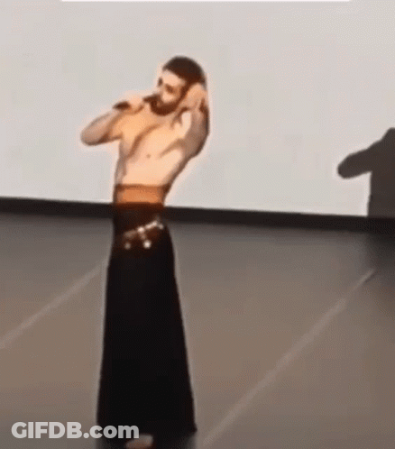 Shirtless Man Dancing On Stage GIF