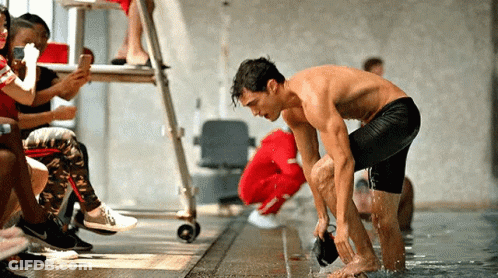Shirtless Man Diving Into Pool GIF