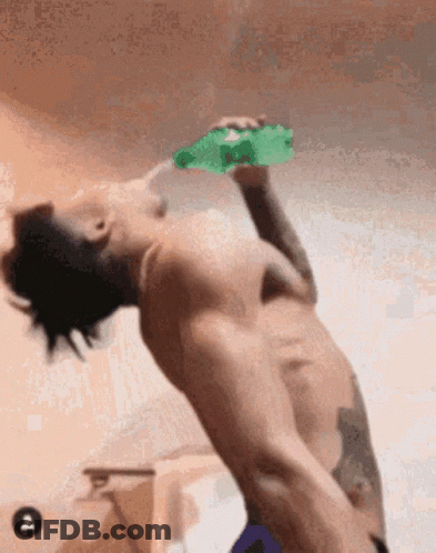 Shirtless Man Drinking Green Bottle GIF