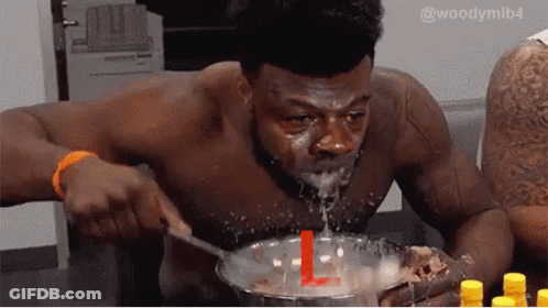 Shirtless Man Eating Bowl Of Food With Spoon GIF