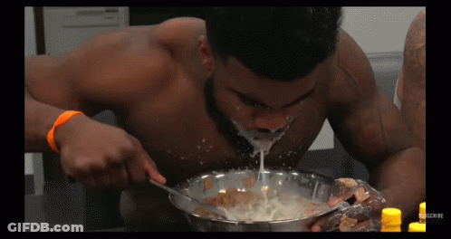 Shirtless Man Eating Cereal GIF