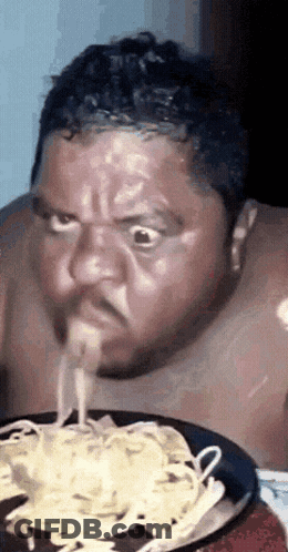 Shirtless Man Eating Spaghetti GIF