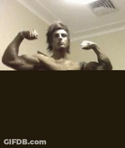 Shirtless Man Flexing Muscles GIF