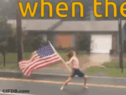 Shirtless Man Holding American Flag GIF