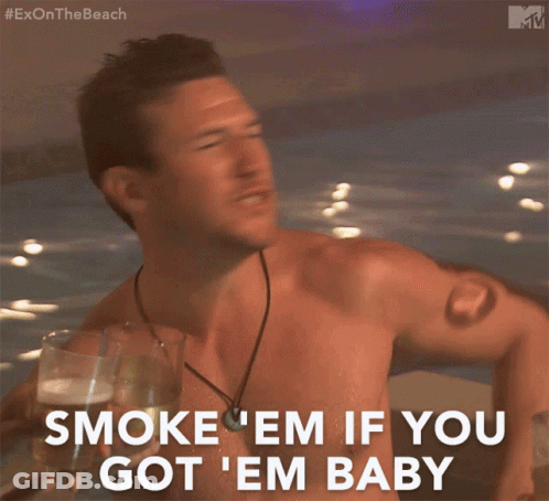 Shirtless Man Holding Beer Says Smoke Em If You Got Em Baby GIF