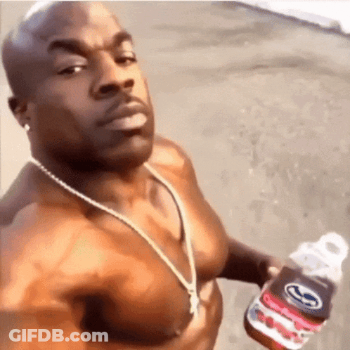 Shirtless Man Holding Bottle Of Soda GIF