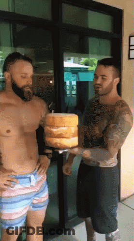 Shirtless Man Holding Cakes GIF
