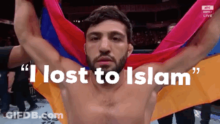 Shirtless Man Holding Colorful Flag I Lost To Islam GIF