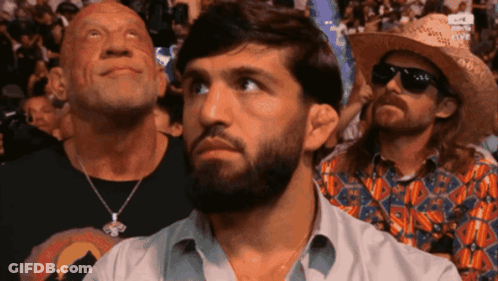 Shirtless Man Holding Colorful Flag Saying I Lost To Islam GIF