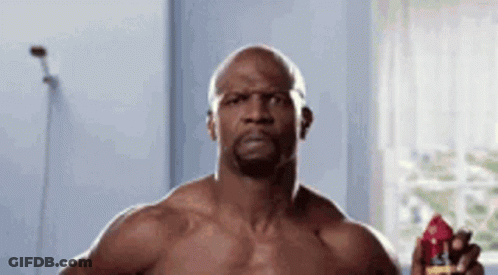 Shirtless Man Holding Spray Deodorant GIF