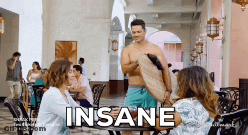 Shirtless Man Holding Surfboard Saying Insane GIF