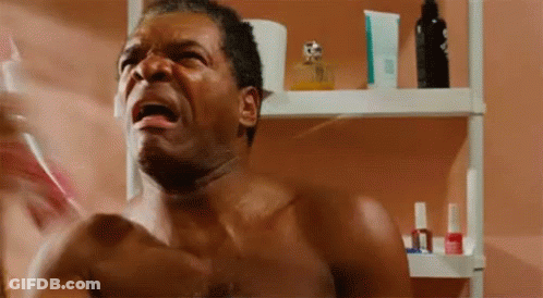 Shirtless Man Holding Toothbrush In Bathroom Mirror GIF