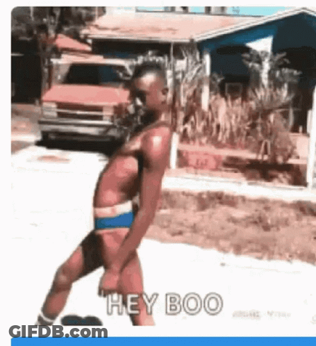 Shirtless Man In Bathing Suit Saying Hey Boo GIF