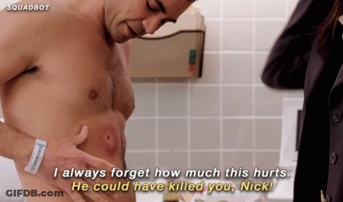 Shirtless Man In Bathroom With Squadbot GIF