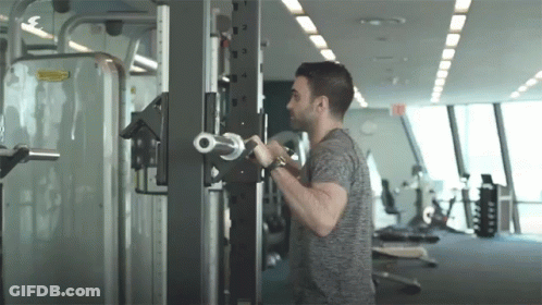 Shirtless Man In Black Shorts Arms In Air GIF